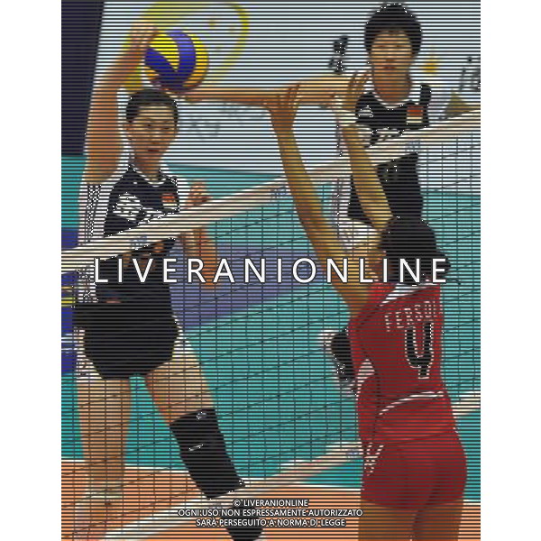 (100814) -- MACAO, Aug. 14, 2010 () -- Xue Ming (L) of China spikes the ball during the match against Dominican Republic at the 2010 FIVB World Grand Prix women\'s volleyball tournament in Macao, south China, Aug. 14, 2010. China lost the match 2-3. (/Lo Ping Fai) ©PHOTOSHOT/Agenzia Aldo Liverani Sas - ITALY ONLY - FIVB World Grand Prix femminile torneo di pallavolo 2010 a Macao, nel sud della Cina