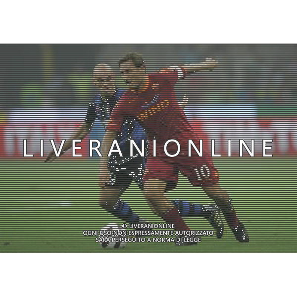 Milano 21-08-2010 Supercoppa Tim Inter-Roma 3:1 nella foto francesco totti e esteban cambiasso ph marco luzzani/ag aldo liverani s.a.s.