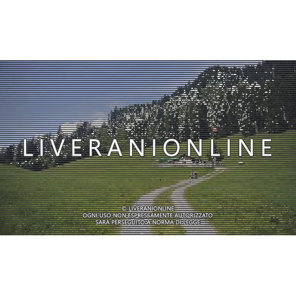 (100821) -- MAIENFELD, Aug. 21, 2010 -- Japanese tourists walk from \'heidihut\' in Maienfeld, eastern Switzerland, Aug. 20, 2010. Maienfeld is the place that Heidi, a character in a worldwide-known novel, lived her life with her grandpa. Yu Yang) (cl) ©photoshot/Agenzia Aldo Liverani Sas - ITALY ONLY - Turisti nella cittadina di Maienfeld, Svizzera orientale. Maienfeld e\' il luogo di montagna dove Heidi, un personaggio di un romanzo conosciuto in tutto il mondo, ha vissuto la sua vita con il suo nonno e peter. 