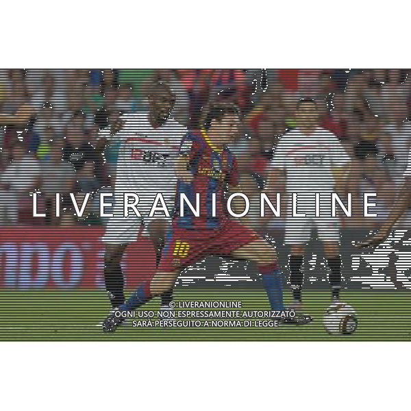 BARCELLONA-SIVIGLIA SUPERCOPPA DI SPAGNA 2010 NELLA FOTO Lionel Messi -Didier Zokora (ALTERPHOTOS/Acero)-AG ALDO LIVERANI ONLY ITALY