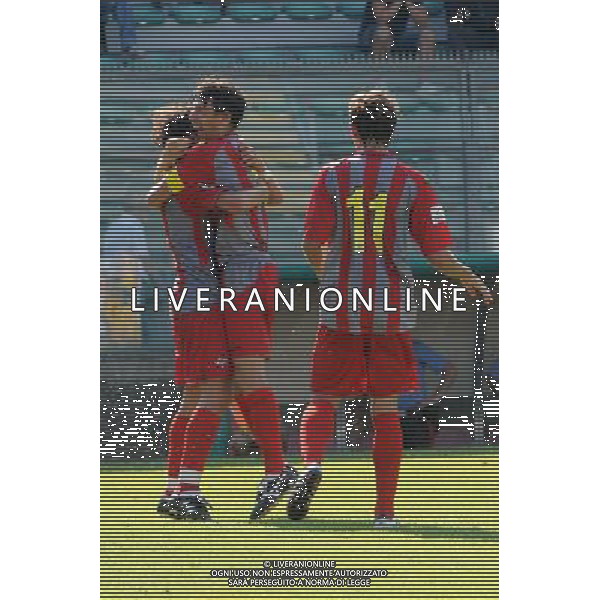 Campionato Lega PRO 1° Divisione girone A Cremona 22-08-2010 Cremonese - Gubbio nella foto: L\'esultanza dei giocatori della Cremonese dopo un gol, Andrea Zanchetta (al centro) e Massimo Coda (di spalle sulla DX) foto Garavaglia - ag. Aldo Liverani sas