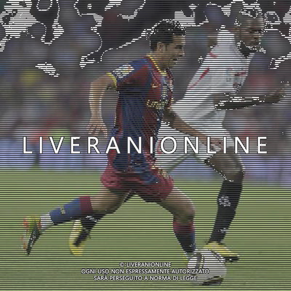 FC Barcelona\'s Pedro Rodriguez (f) and Sevilla\'s Christian Ndri Romaric during SuperCup of Spain Final match. August 21,2010. (ALTERPHOTOS/Acero) BARCELLONA-SIVIGLIA SUPERCOPPA DI SPAGNA 2010 AG ALDO LIVERANI SAS ITALY ONLY *** Local Caption *** .