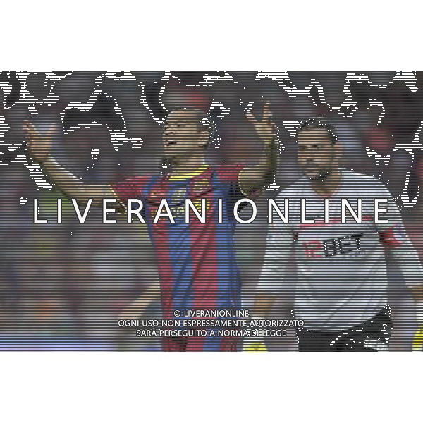 FC Barcelona\'s Daniel Alves and Sevilla\'s Andres Palop (r) during SuperCup of Spain Final match. August 21,2010. (ALTERPHOTOS/Acero) BARCELLONA-SIVIGLIA SUPERCOPPA DI SPAGNA 2010 AG ALDO LIVERANI SAS ITALY ONLY *** Local Caption *** .