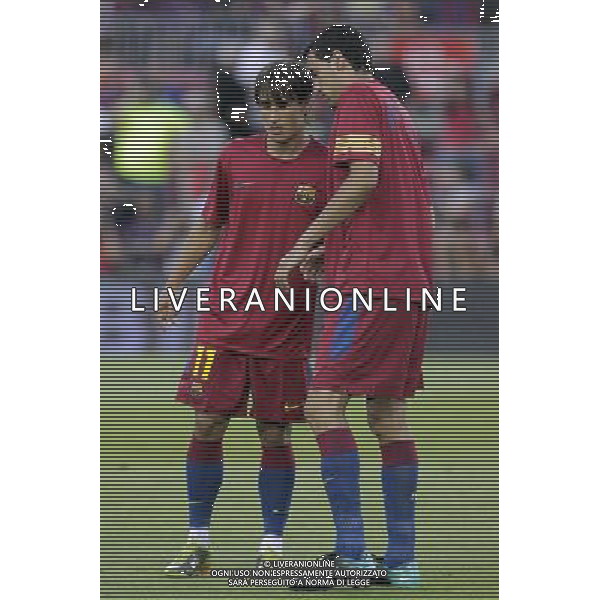 FC Barcelona\'s Bojan Krkic (l) and Sergio Busquets during SuperCup of Spain Final match. August 21,2010. (ALTERPHOTOS/Acero) BARCELLONA-SIVIGLIA SUPERCOPPA DI SPAGNA 2010 AG ALDO LIVERANI SAS ITALY ONLY *** Local Caption *** .