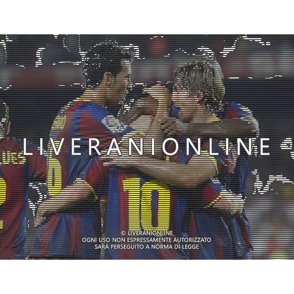 FC Barcelona\'s Sergio Busquets, Maxwell, Lionel Messi and Seydou Keita celebrate goal during SuperCup of Spain Final match. August 21,2010. (ALTERPHOTOS/Acero) BARCELLONA-SIVIGLIA SUPERCOPPA DI SPAGNA 2010 AG ALDO LIVERANI SAS ITALY ONLY *** Local Caption *** .