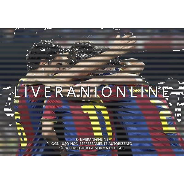 FC Barcelona\'s Xavi Hernandez, Bojan Krkic and Daniel Alves celebrate goal during SuperCup of Spain Final match. August 21,2010. (ALTERPHOTOS/Acero) BARCELLONA-SIVIGLIA SUPERCOPPA DI SPAGNA 2010 AG ALDO LIVERANI SAS ITALY ONLY *** Local Caption *** .