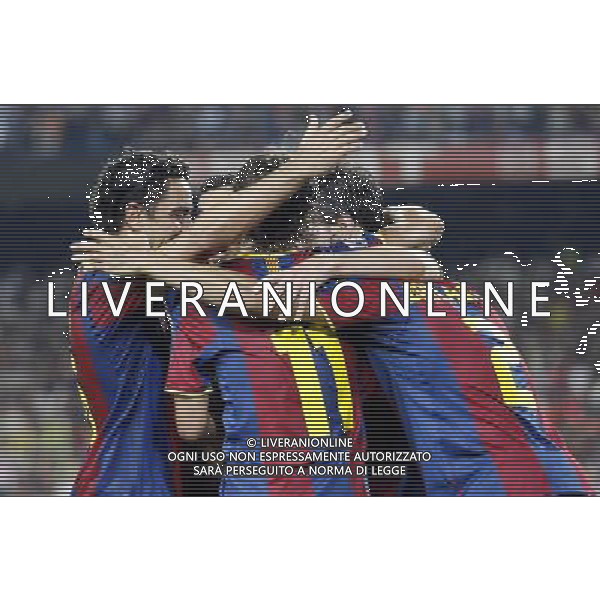 FC Barcelona\'s Xavi Hernandez, Bojan Krkic and Daniel Alves celebrate goal during SuperCup of Spain Final match. August 21,2010. (ALTERPHOTOS/Acero) BARCELLONA-SIVIGLIA SUPERCOPPA DI SPAGNA 2010 AG ALDO LIVERANI SAS ITALY ONLY *** Local Caption *** .