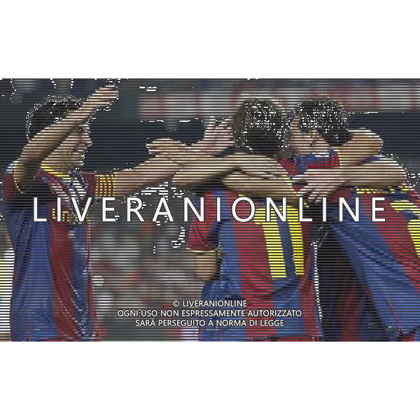 FC Barcelona\'s Xavi Hernandez, Bojan Krkic and Daniel Alves celebrate goal during SuperCup of Spain Final match. August 21,2010. (ALTERPHOTOS/Acero) BARCELLONA-SIVIGLIA SUPERCOPPA DI SPAGNA 2010 AG ALDO LIVERANI SAS ITALY ONLY *** Local Caption *** .