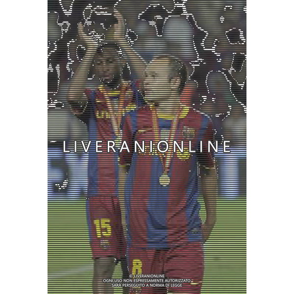 FC Barcelona\'s Seydou Keita (l) and Andres Iniesta celebrate the victory in the SuperCup of Spain Final match. August 21,2010. (ALTERPHOTOS/Acero) BARCELLONA-SIVIGLIA SUPERCOPPA DI SPAGNA 2010 AG ALDO LIVERANI SAS ITALY ONLY *** Local Caption *** .