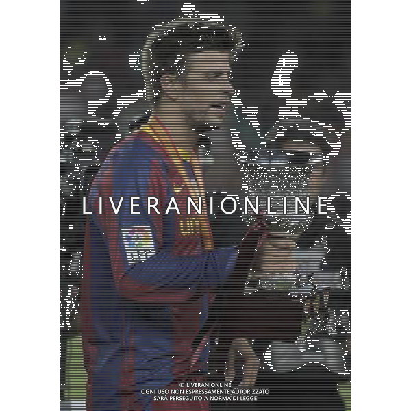 FC Barcelona\'s Gerard Pique celebrates the victory in the SuperCup of Spain Final match. August 21,2010. (ALTERPHOTOS/Acero) BARCELLONA-SIVIGLIA SUPERCOPPA DI SPAGNA 2010 AG ALDO LIVERANI SAS ITALY ONLY *** Local Caption *** .