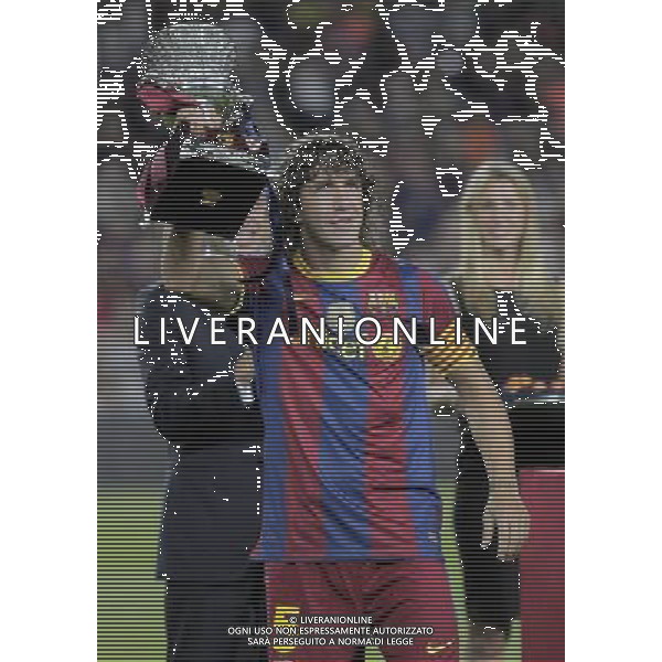 FC Barcelona\'s captain Carles Puyol with the Trophy of winner in the SuperCup of Spain. August 21,2010. (ALTERPHOTOS/Acero) BARCELLONA-SIVIGLIA SUPERCOPPA DI SPAGNA 2010 AG ALDO LIVERANI SAS ITALY ONLY *** Local Caption *** .