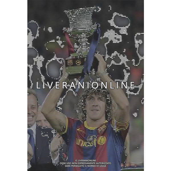 FC Barcelona\'s captain Carles Puyol with the Trophy of winner in the SuperCup of Spain. August 21,2010. (ALTERPHOTOS/Acero) BARCELLONA-SIVIGLIA SUPERCOPPA DI SPAGNA 2010 AG ALDO LIVERANI SAS ITALY ONLY *** Local Caption *** .