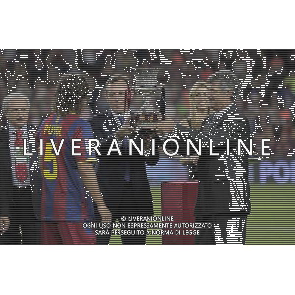 FC Barcelona\'s President Sandro Rosell, the Spanish Football Federation President Angel Maria Villar (r) and the FC Barcelona\'s captain with the winner trophy in the SuperCup of Spain Final match. August 21,2010. (ALTERPHOTOS/Acero) BARCELLONA-SIVIGLIA SUPERCOPPA DI SPAGNA 2010 AG ALDO LIVERANI SAS ITALY ONLY *** Local Caption *** .