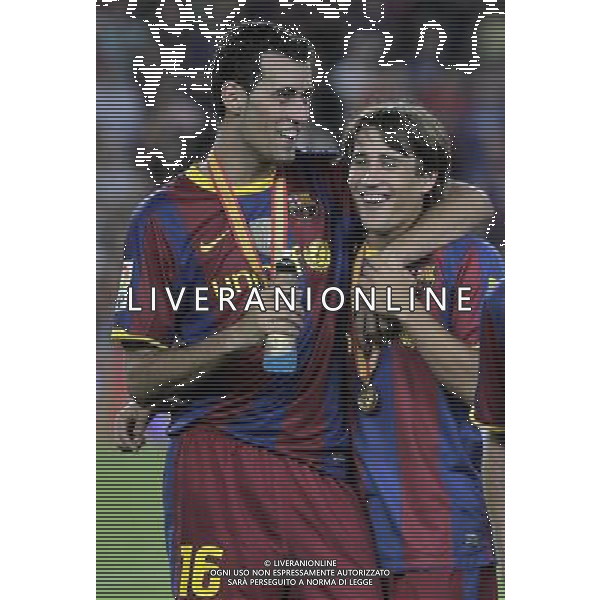 FC Barcelona\'s Sergio Busquets (l) and Bojan Krkic celebrate the victory in the SuperCup of Spain Final match. August 21,2010. (ALTERPHOTOS/Acero) BARCELLONA-SIVIGLIA SUPERCOPPA DI SPAGNA 2010 AG ALDO LIVERANI SAS ITALY ONLY *** Local Caption *** .