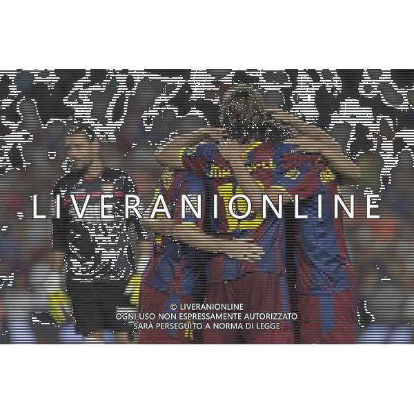 FC Barcelona\'s Lionel Messi, Adriano Correia, Maxwell and David Villa celebrate goal in presence of Sevilla\'s Andres Palop (l) during SuperCup of Spain Final match. August 21,2010. (ALTERPHOTOS/Acero) BARCELLONA-SIVIGLIA SUPERCOPPA DI SPAGNA 2010 AG ALDO LIVERANI SAS ITALY ONLY *** Local Caption *** .