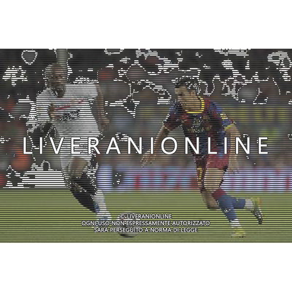 FC Barcelona\'s Pedro Rodriguez (l) and Sevilla\'s Didier Zokora during SuperCup of Spain Final match. August 21,2010. (ALTERPHOTOS/Acero) BARCELLONA-SIVIGLIA SUPERCOPPA DI SPAGNA 2010 AG ALDO LIVERANI SAS ITALY ONLY *** Local Caption *** .