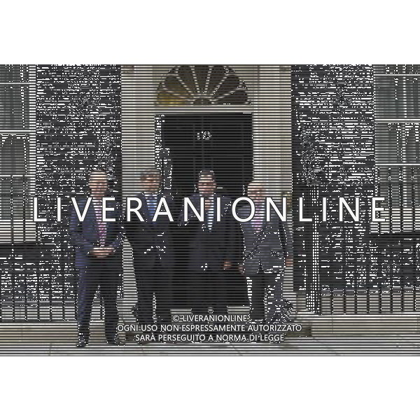 Fifa inspectors have begun a four-day visit as part of England\'s quest to host the 2018 World Cup.The Fifa delegation will meet Deputy Prime Minister Nick Clegg in Downing Street before touring Wembley Stadium with England manager Fabio Capello. Photo Shows; Fifa arriving at 10 Downing Street In Pic: Chief Executive Andy Anson, chairman of the Chilean FA Harold Mayne-Nicholls, South Africa 2010 chief executive Danny Jordaan and chairman of the 2018 World Cup bid team Geoff Thompson ©photoshot/Agenzia Aldo Liverani Sas - ITALY ONLY - LONDRA: Gli ispettori della Fifa hanno iniziato una visita di quattro giorni in Inghilterra ufficialmente candidata per ospitare i Mondiali di calcio o Coppa del Mondo FIFA del 2018. La delegazione incontrera\' prima il Vice Primo Ministro Nick Clegg a Downing Street poi il giro dello stadio di Wembley con il manager dell\'Inghilterra Fabio Capello.