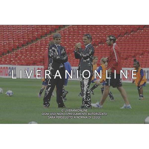 Fifa inspectors have begun a four-day visit as part of England\'s quest to host the 2018 World Cup.The Fifa delegation will meet Deputy Prime Minister Nick Clegg in Downing Street before touring Wembley Stadium with England manager Fabio Capello. Photo Shows; Fifa inspectors at Wembley Stadium with Fabio Capello. ©photoshot/Agenzia Aldo Liverani Sas - ITALY ONLY - LONDRA: Gli ispettori della Fifa hanno iniziato una visita di quattro giorni in Inghilterra ufficialmente candidata per ospitare i Mondiali di calcio o Coppa del Mondo FIFA del 2018. La delegazione incontrera\' prima il Vice Primo Ministro Nick Clegg a Downing Street poi il giro dello stadio di Wembley con il manager dell\'Inghilterra Fabio Capello.