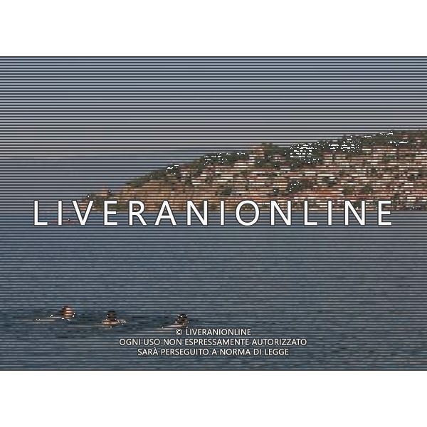 (100826) -- OHRID, Aug. 26, 2010 () -- Tourists swim in the Lake Ohrid in southwest Macedonia, Aug. 25, 2010. As an important cultural centre during the Byzantine times, Ohrid, together with the Lake Ohrid, was accepted as a World Cultural Heritage Site by UNESCO in 1980. (/Zeng Yi) (ypf) ©photoshot/Agenzia Aldo Liverani Sas - ITALY ONLY - Vedute della citta\' vecchia e il lago di Ocrida, nella Macedonia, 25 agosto 2010. Importante centro culturale durante il periodo bizantino,  stato ritenuto come patrimonio mondiale dell\'umanitˆ dall\'UNESCO nel 1980. 