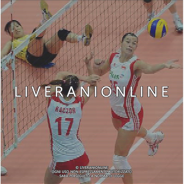 (100828) -- NINGBO, Aug. 28, 2010 () -- Katarzyna Gajgal (R) of Poland saves the ball during the fourth round match against Japan at the 2010 FIVB World Grand Prix Final Round women\'s volleyball tournament in Ningbo, east China\'s Zhejiang Province, Aug. 28, 2010. Poland beat Japan 3-1.(/Xu Yu) (zc) ©PHOTOSHOT/Agenzia Aldo Liverani Sas - ITALY ONLY - Quarto round tra Polonia e Giappone al torneo di pallavolo FIVB 2010 World Grand Prix Final Round\'s Volley donne a Ningbo, Cina