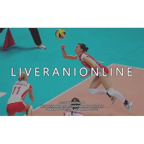 (100828) -- NINGBO, Aug. 28, 2010 () -- Mariola Zenik (R) of Poland saves the ball during the fourth round match against Japan at the 2010 FIVB World Grand Prix Final Round women\'s volleyball tournament in Ningbo, east China\'s Zhejiang Province, Aug. 28, 2010. Poland beat Japan 3-1.(/Xu Yu) (zc) ©PHOTOSHOT/Agenzia Aldo Liverani Sas - ITALY ONLY - Quarto round tra Polonia e Giappone al torneo di pallavolo FIVB 2010 World Grand Prix Final Round\'s Volley donne a Ningbo, Cina