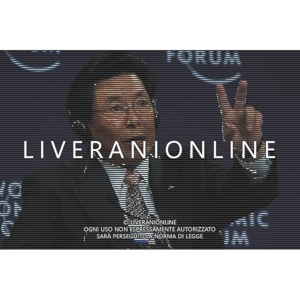 (100914) -- TIANJIN, Sept. 14, 2010 -- Wei Jiafu, group president and chief executive officer of China Ocean Shipping Group Co., makes a gesture while attending the plenary session on \'Rethinking the Corporation in the 21st Century\' of the World Economic Forum (WEF) Annual Meeting of the New Champions 2010, at Tianjin Meijiang Convention Center, in north China\'s Tianjin Municipality on Sept. 14, 2010. Li Mingfang)(axy) ©PHOTOSHOT/Agenzia Aldo Liverani Sas - ITALY ONLY - EDITORIAL USE ONLY -