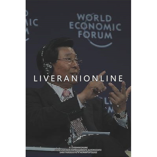 (100914) -- TIANJIN, Sept. 14, 2010 -- Wei Jiafu, group president and chief executive officer of China Ocean Shipping Group Co., makes a gesture while attending the plenary session on \'Rethinking the Corporation in the 21st Century\' of the World Economic Forum (WEF) Annual Meeting of the New Champions 2010, at Tianjin Meijiang Convention Center, in north China\'s Tianjin Municipality on Sept. 14, 2010. Li Mingfang)(axy) ©PHOTOSHOT/Agenzia Aldo Liverani Sas - ITALY ONLY - EDITORIAL USE ONLY -