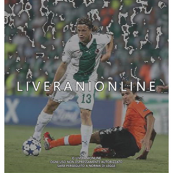 UEFA Champions League group C match between Bursaspor Turkey and Valencia Spain at Ataturk Stadium in Bursa, Turkey 14.09.2010 Valencia won scored 4 - 0 Pictured: Gustav Svensson (up) of Bursaspor and Mehmet Topal (below) of Valencia. FOT. SESKIMPHOTO/NEWSPIX/Agenzia Aldo Liverani Sas ONLY ITALY *** Local Caption *** .