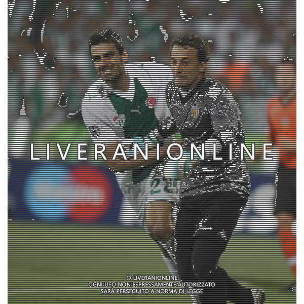 UEFA Champions League group C match between Bursaspor Turkey and Valencia Spain at Ataturk Stadium in Bursa, Turkey 14.09.2010 Valencia won scored 4 - 0 Pictured: Turgay Bahadir (back) of Bursaspor and Goalkeeper Cesar Sanchez (front) of Valencia. FOT. SESKIMPHOTO/NEWSPIX/Agenzia Aldo Liverani Sas ONLY ITALY *** Local Caption *** .