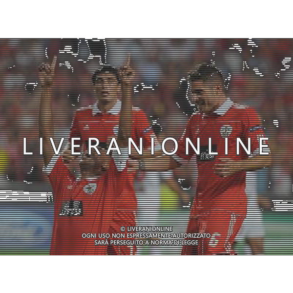 20100914: LISBON, PORTUGAL - SL Benfica vs Hapoel Tel Aviv FC: UEFA Champions League 2010/2011 - Group Stage. In picture: Luisao, Javi Garcia and Oscar Cardozo (Benfica) celebrate Benfica\'s 1st goal. FOTO: CITYFILES/NEWSPIX.PL/ag.ALDO LIVERANI sas italy *** Local Caption *** ,