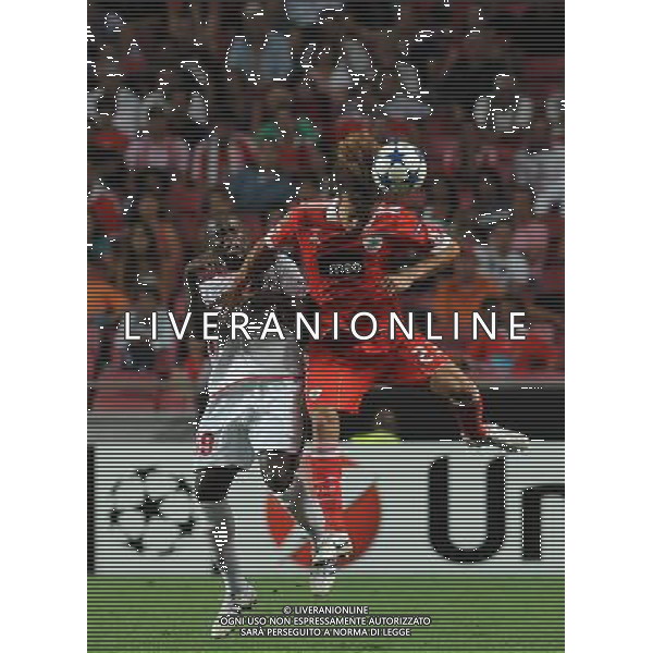 20100914: LISBON, PORTUGAL - SL Benfica vs Hapoel Tel Aviv FC: UEFA Champions League 2010/2011 - Group Stage. In picture: David Luiz (Benfica) and Toto Tamuz (Hapoel Tel Aviv). FOTO: CITYFILES/NEWSPIX.PL/ag.ALDO LIVERANI sas italy *** Local Caption *** ,