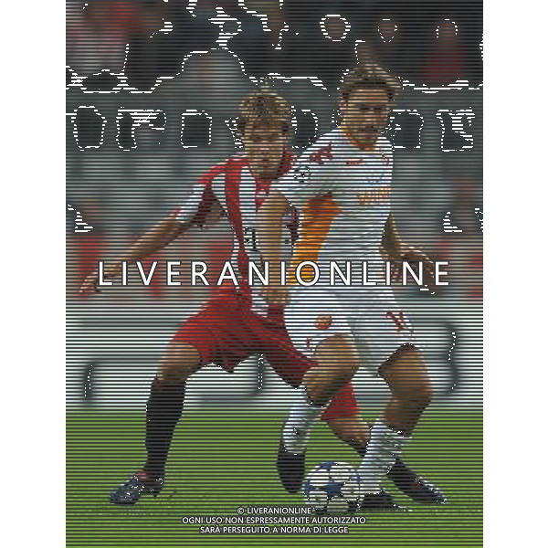 UEFA Champions League 2010/2011 Gruppo E Monaco (Germania) - 15.09.2010 Bayern Monaco-Roma Nella Foto:totti francesco e badstuber /Ph.Vitez-Ag. Aldo Liverani