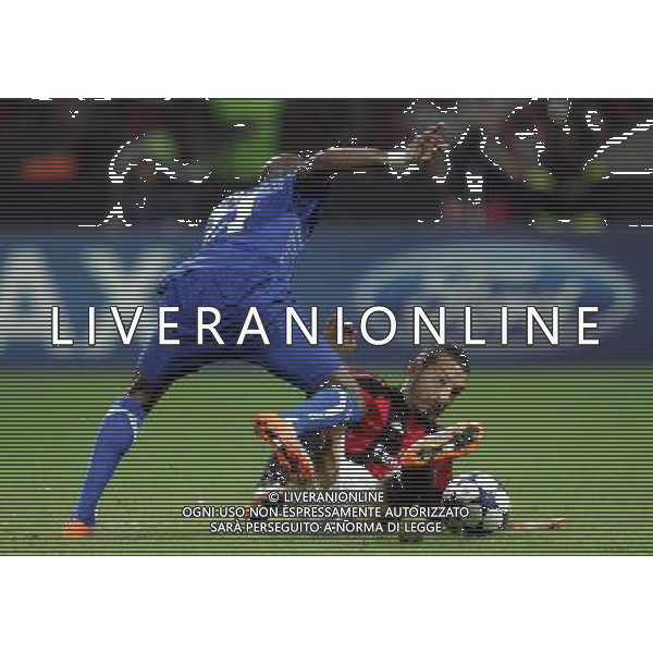 Milano 15-09-2010 Champions League 2010/11 Milan-Auxerre 2:0 nella foto steeven langil e gianluca zambrotta ph marco luzzani/ag aldo liverani s.a.s.