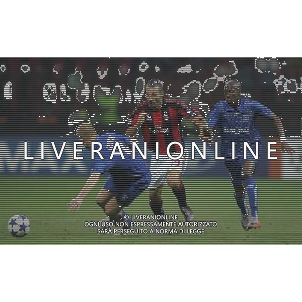 Milano 15-09-2010 Champions League 2010/11 Milan-Auxerre 2:0 nella foto steeven langil, stephane grichting e gianluca zambrotta ph marco luzzani/ag aldo liverani s.a.s.