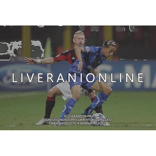 Milano 15-09-2010 Champions League 2010/11 Milan-Auxerre 2:0 nella foto ignazio abate e kamel chafni ph marco luzzani/ag aldo liverani s.a.s.