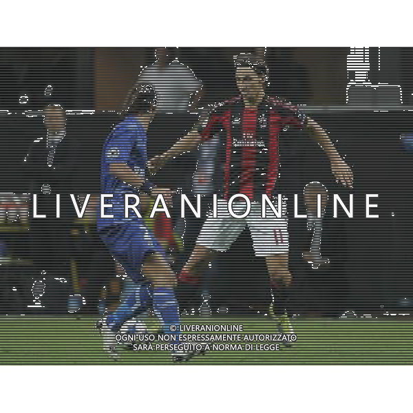 Milano 15-09-2010 Champions League 2010/11 Milan-Auxerre 2:0 nella foto zlatan ibrahimovic e cedric hengbart ph marco luzzani/ag aldo liverani s.a.s.
