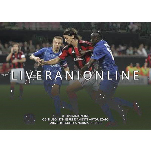 Milano 15-09-2010 Champions League 2010/11 Milan-Auxerre 2:0 nella foto zlatan ibrahimovic, benoit pedretti e dennis oliech ph marco luzzani/ag aldo liverani s.a.s.