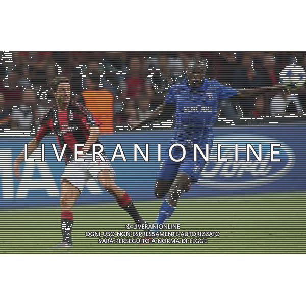 MILANO 15.09.2010-CHAMPIONS LEAGUE MATCH GROUP G MILAN - AJ AUXERRE 2:0 NELLA FOTO LUCA ANTONINI DENNIS OLIECH FOT. PIOTR KUCZA/NEWSPIX.PL/AG ALDO LIVERANI ONLY ITALY 