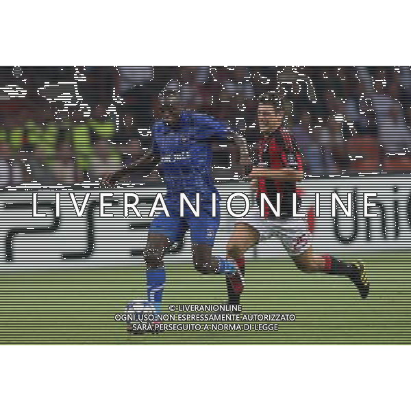 MILANO 15.09.2010-CHAMPIONS LEAGUE MATCH GROUP G MILAN - AJ AUXERRE 2:0 NELLA FOTO DENNIS OLIECH DANIELE BONERA FOT. PIOTR KUCZA/NEWSPIX.PL/AG ALDO LIVERANI ONLY ITALY 