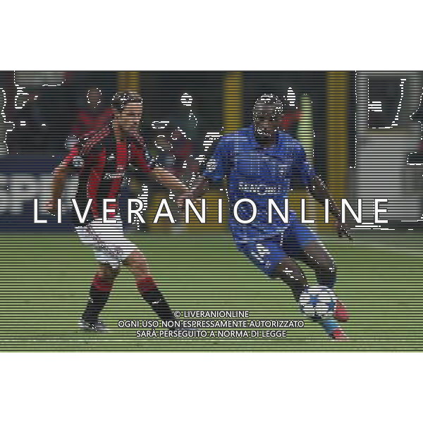 MILANO 15.09.2010-CHAMPIONS LEAGUE MATCH GROUP G MILAN - AJ AUXERRE 2:0 NELLA FOTO LUCA ANTONINI DENNIS OLIECH FOT. PIOTR KUCZA/NEWSPIX.PL/AG ALDO LIVERANI ONLY ITALY 