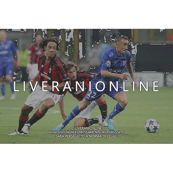 MILANO 15.09.2010-CHAMPIONS LEAGUE MATCH GROUP G MILAN - AJ AUXERRE 2:0 NELLA FOTO ALESANDRO NESTA (MILAN) . (P/R) IRENEUSZ JELEN (AUXERRE) FOT. PIOTR KUCZA/NEWSPIX.PL/AG ALDO LIVERANI ONLY ITALY 