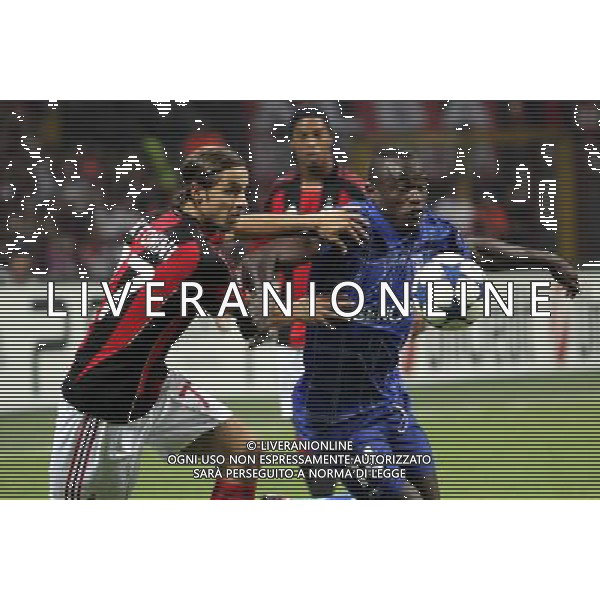 MILANO 15.09.2010-CHAMPIONS LEAGUE MATCH GROUP G MILAN - AJ AUXERRE 2:0 NELLA FOTO ANTONINI LUCA (MILAN), (P/R) DENIS OLIECH (AUXERRE ) FOT. PIOTR KUCZA/NEWSPIX.PL/AG ALDO LIVERANI ONLY ITALY 