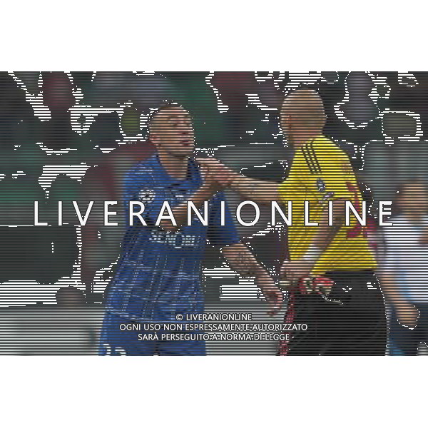 MILANO 15.09.2010-CHAMPIONS LEAGUE MATCH GROUP G MILAN - AJ AUXERRE 2:0 NELLA FOTO IRENEUSZ JELEN (L), CHRISTAIN ABBIATI (R) FOT. PIOTR KUCZA/NEWSPIX.PL/AG ALDO LIVERANI ONLY ITALY 