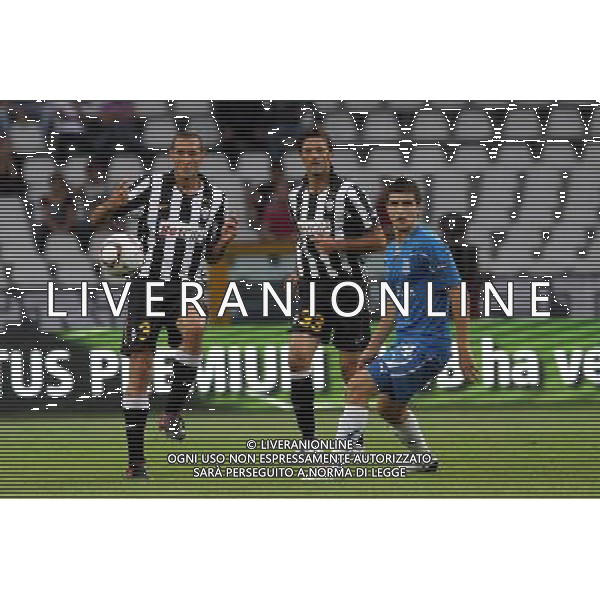 TORINO 16/09/2010 UEFA EUROPA LEAGUE 2010-2011 - PARTITA JUVENTUS vs LECH POZNAN nella foto: GIORGIO CHIELLINI (S/C) NICOLA LEGROTTAGLIE (JUVENTUS) , (P/R) SEMIR STILIC (LECH)) ©  JAKUB PIASECKI CYFRASPORT/NEWSPIX.PL- AG. ALDO LIVERANI SAS italy only 