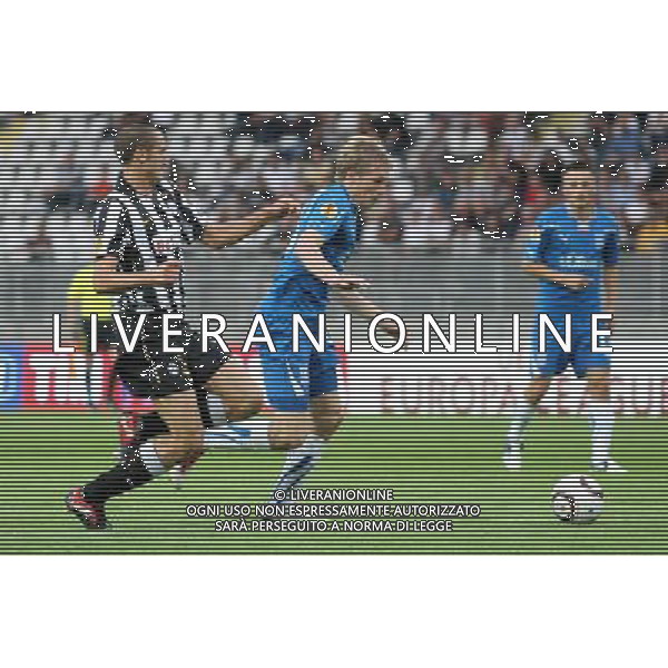 TORINO 16/09/2010 UEFA EUROPA LEAGUE 2010-2011 - PARTITA JUVENTUS vs LECH POZNAN nella foto: ARTJOMS RUDNEVS - GIORGIO CHIELLINI ©Ê LUKASZ GROCHALA/CYFRASPORT/NEWSPIX.PL- AG. ALDO LIVERANI SAS italy only 