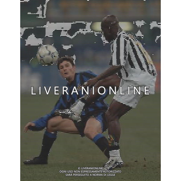 Milano 12-02-04 Inter-Juventus Coppa Italia Tim Cup 2003/04 nella foto appiah zanetti ph marco luzzani/ag aldo liverani s.a.s.