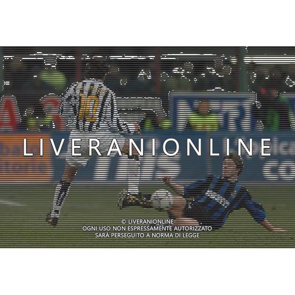 Milano 12-02-04 Inter-Juventus Coppa Italia Tim Cup 2003/04 nella foto helveg del piero ph marco luzzani/ag aldo liverani s.a.s.