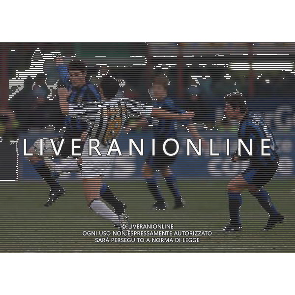 Milano 12-02-04 Inter-Juventus Coppa Italia Tim Cup 2003/04 nella foto zambrotta zanetti emre ph marco luzzani/ag aldo liverani s.a.s.