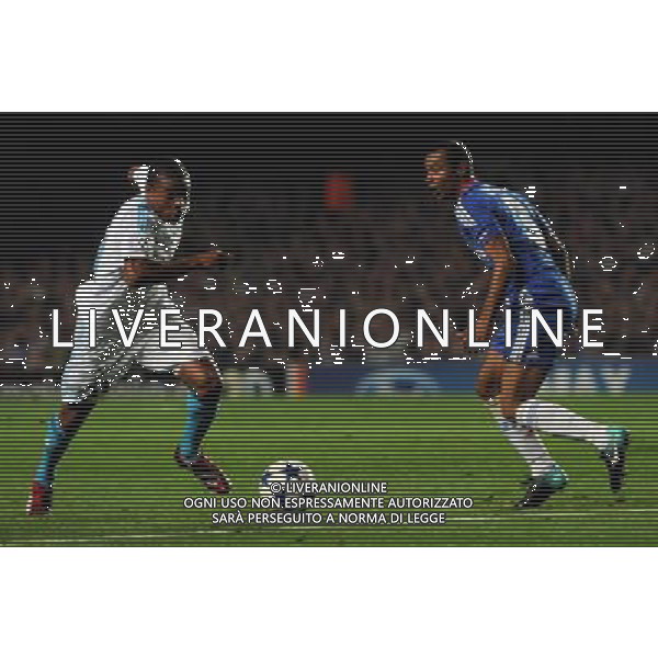 Loic Remy pass Ashley Cole at the Chelsea FC Vs Olympique de Marseille for the Champions League in London, Great Britain on 27 September 2010 © FACUNDO ARRIZABALAGA - PHOTOSHOT - AG. ALDO LIVERANI SAS ITALY ONLY partita: CHELSEA vs OLYMPIQUE MARSIGLIA. CHAMPIONS LEAGUE 2010/2011 