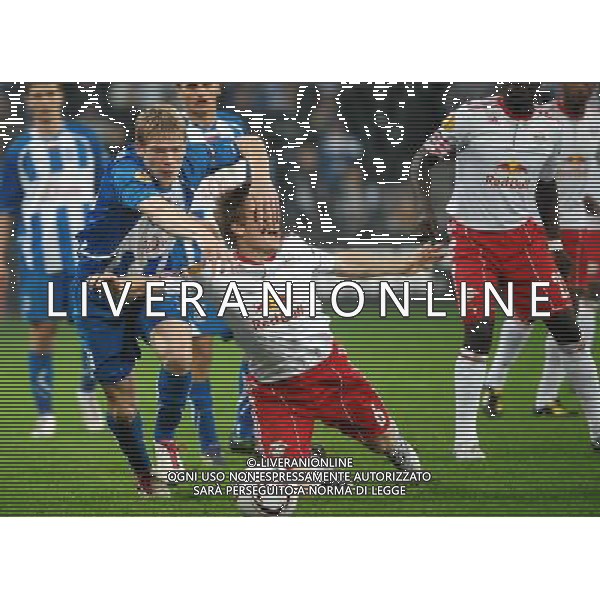 EUROPA LEAGUE 2010-2011- partita: LECH POZNAN FC RED BULL SALZBURG nella foto: ARTJOMS RUDNEVS - CHRISTIAN SCHWEGLER © NORBERT BARCZYK / NEWSPIX.PL - AG. ALDO LIVERANI SAS ITALY ONLY *** Local Caption *** 